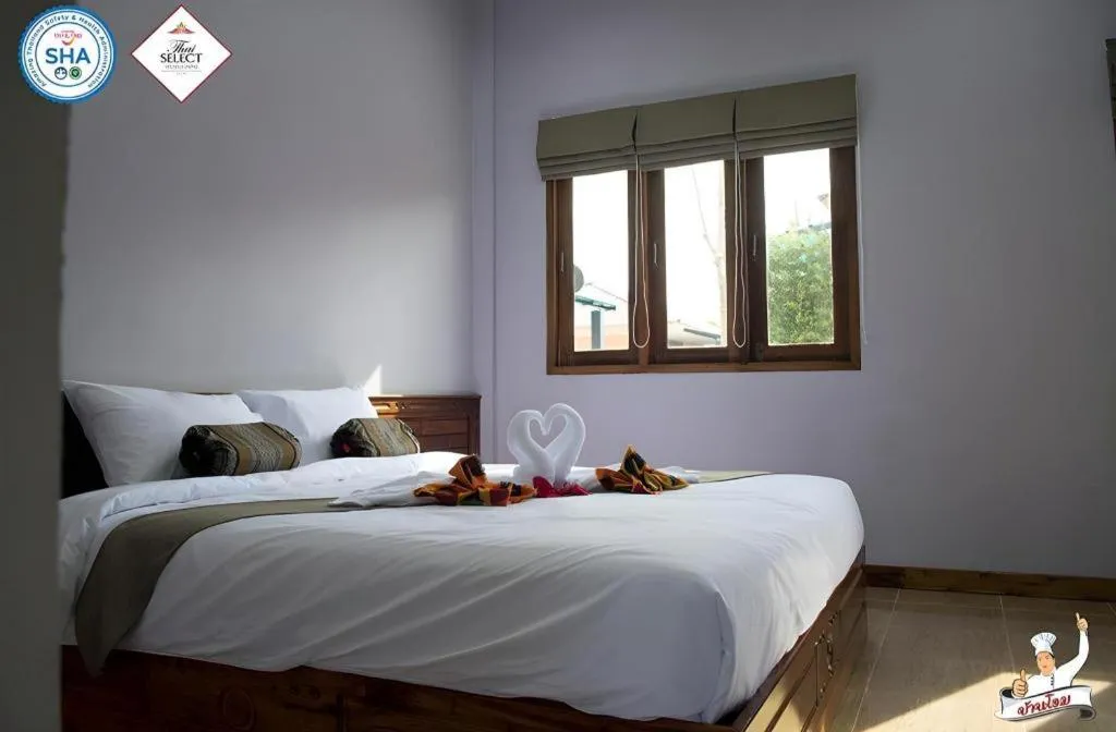 Bed in Baan Home Resort