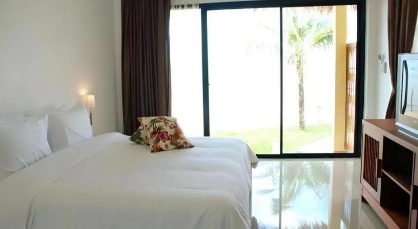 Bed in Villa Phra Chan Resort