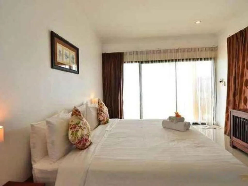 Bed in Villa Phra Chan Resort