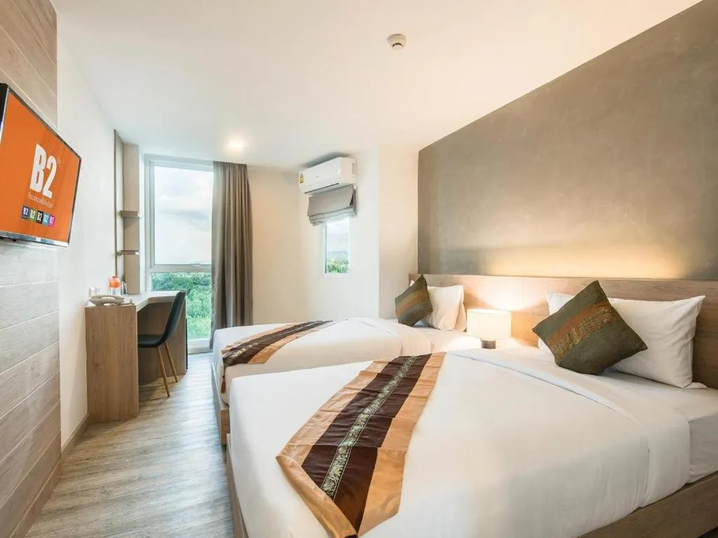 Bed in B2 Phrae Boutique and Budget Hotel