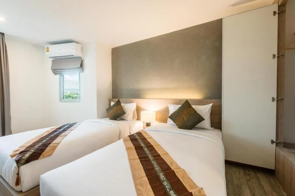 Bed in B2 Phrae Boutique and Budget Hotel