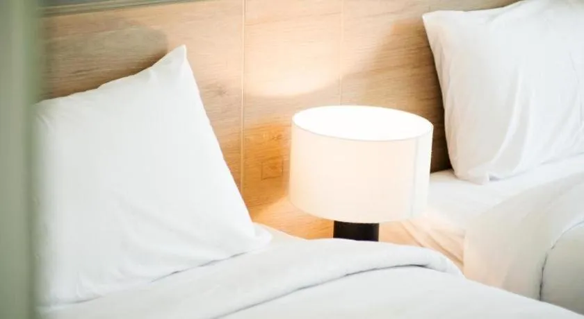 Bed in B2 Phrae Boutique and Budget Hotel