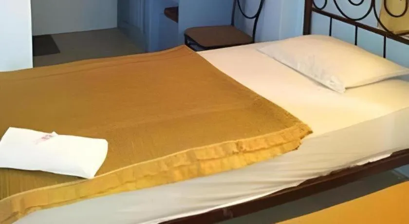 Bed in Centaur Inn Hotel