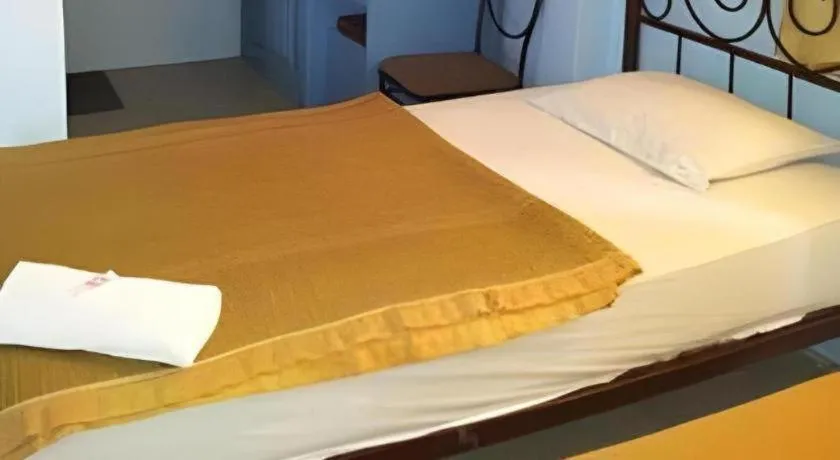 Bed in Centaur Inn Hotel