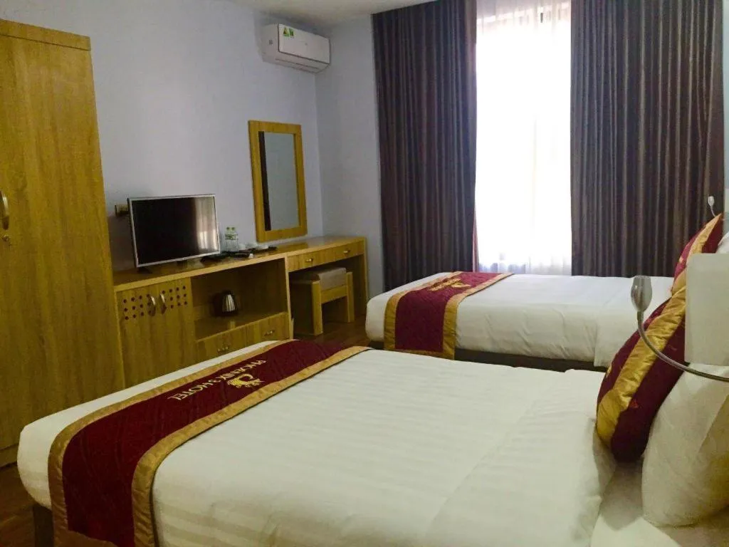 Bed in Phoenix Hotel 3