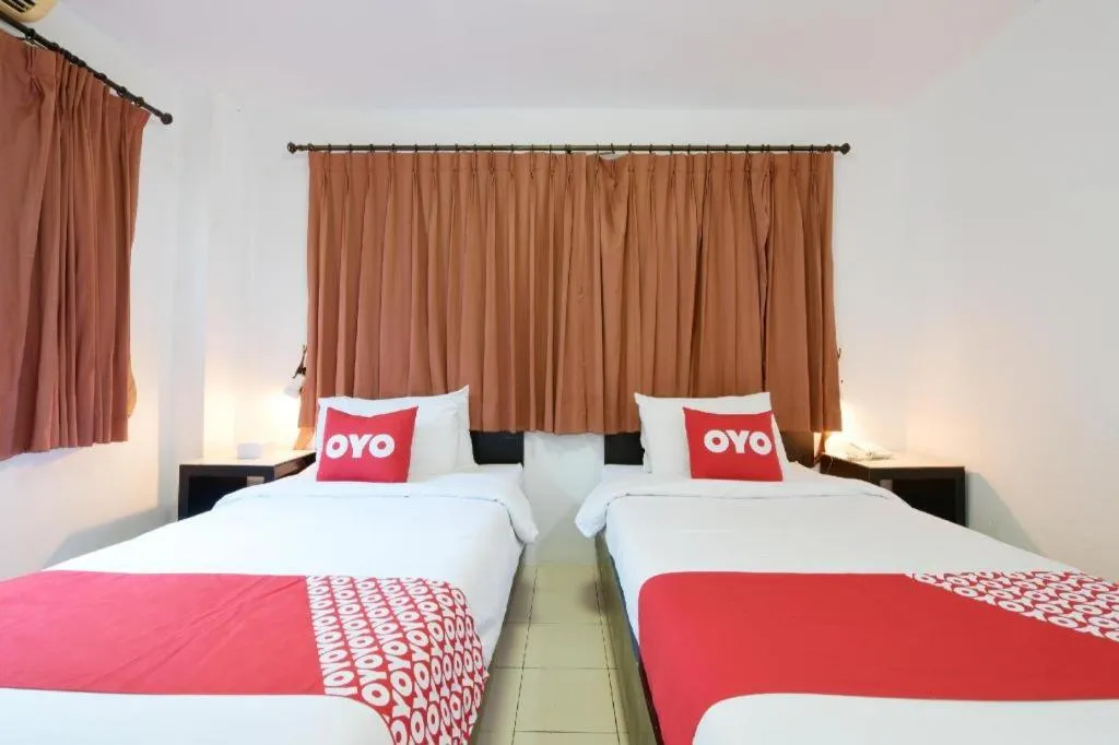 Bed in OYO 520 Pattaya Cantina