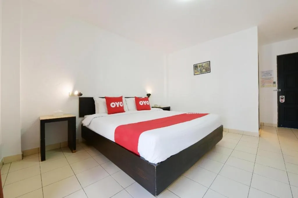Bed in OYO 520 Pattaya Cantina