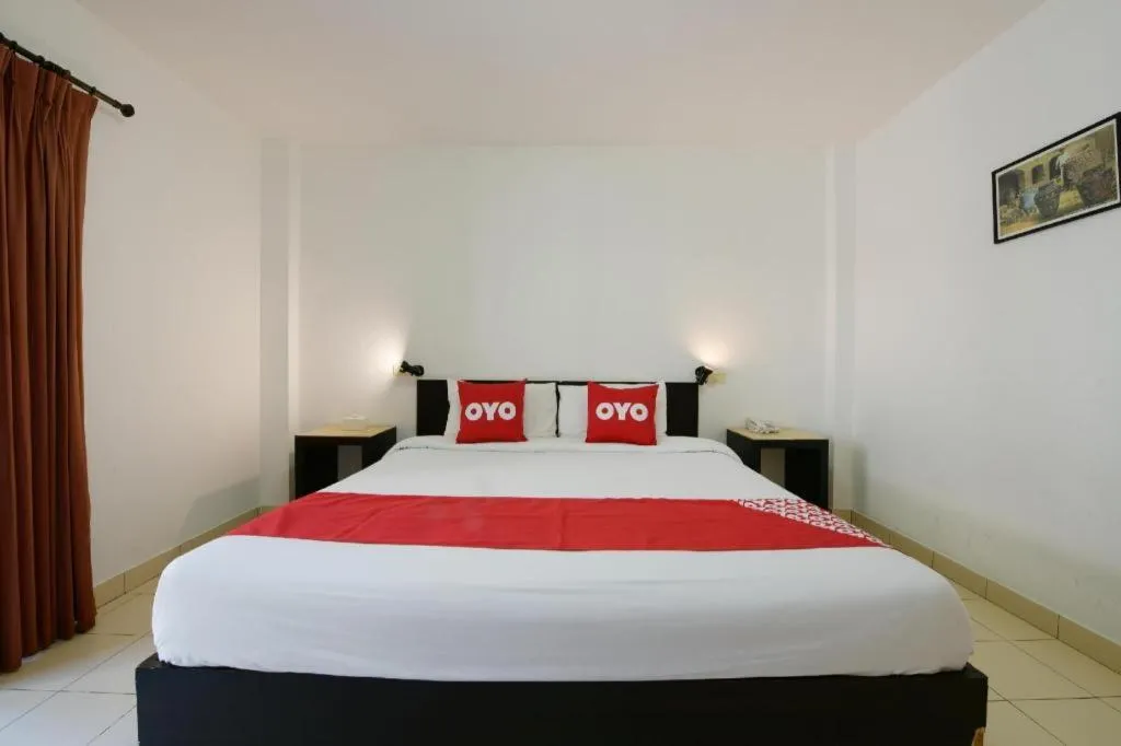 Bed in OYO 520 Pattaya Cantina