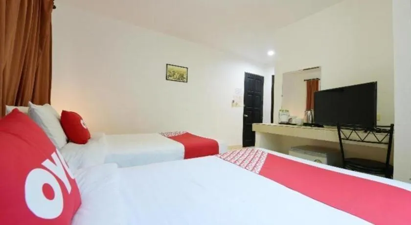 Bed in OYO 520 Pattaya Cantina