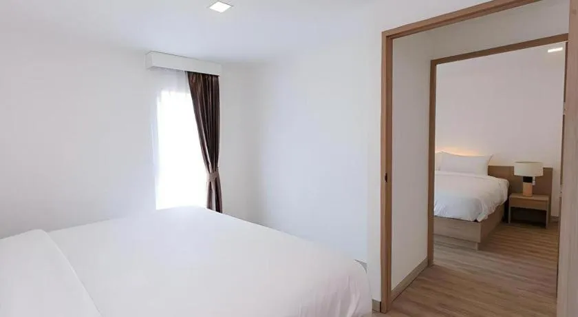 Bed in B2 Nakhonsawan Premier Hotel