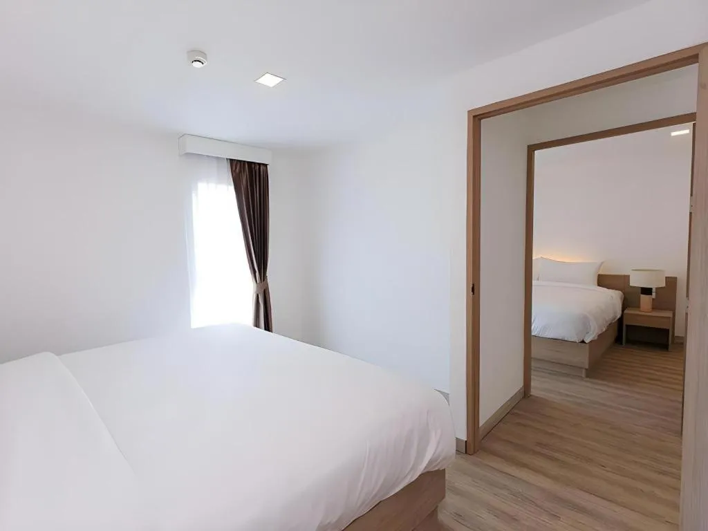 Bed in B2 Nakhonsawan Premier Hotel