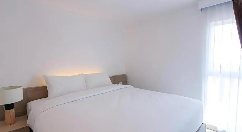 Bed in B2 Nakhonsawan Premier Hotel