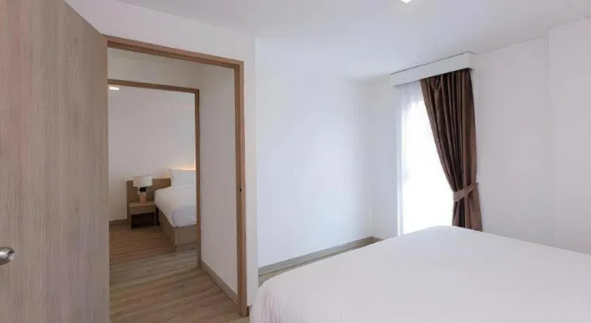 Bed in B2 Nakhonsawan Premier Hotel