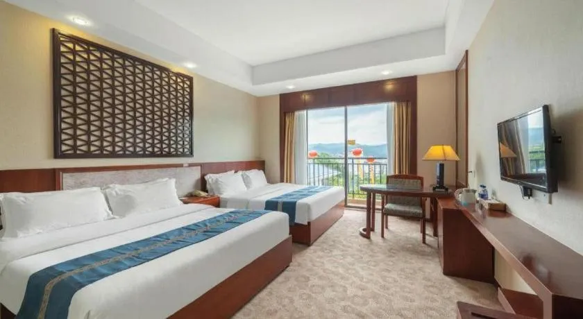 Bed in Longyan Capital International Hot Spring Resort