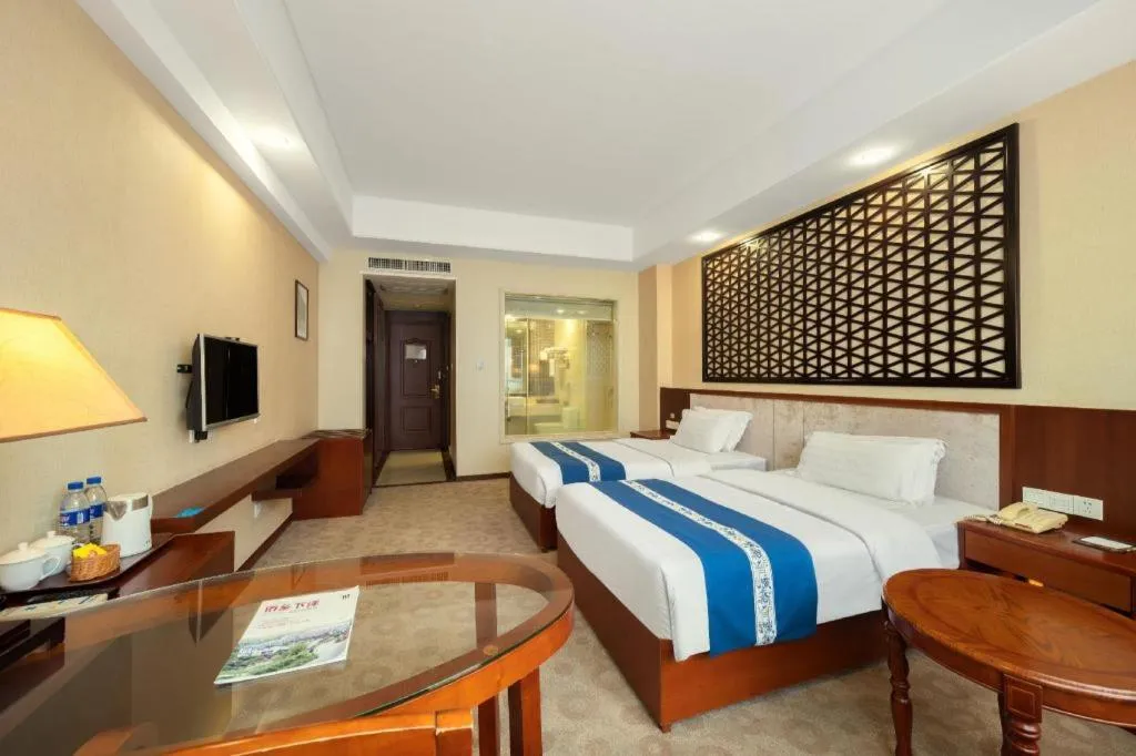 Bed in Longyan Capital International Hot Spring Resort