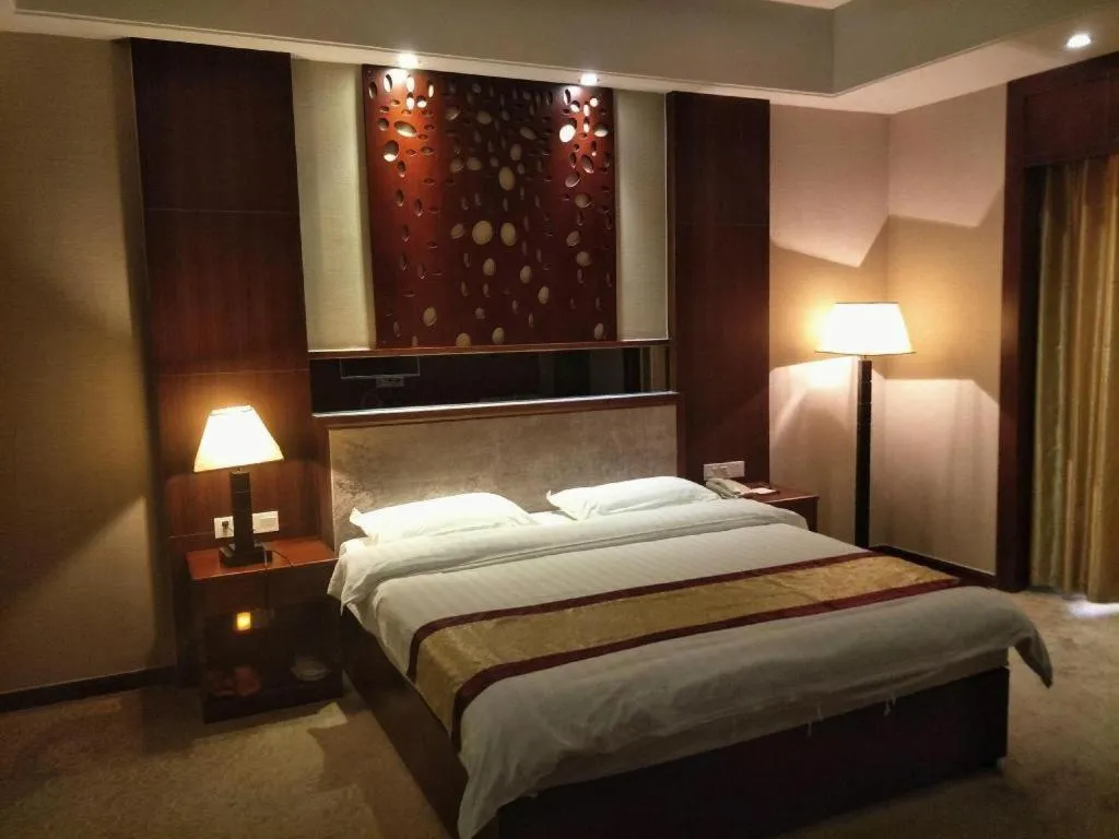 Bed in Longyan Capital International Hot Spring Resort