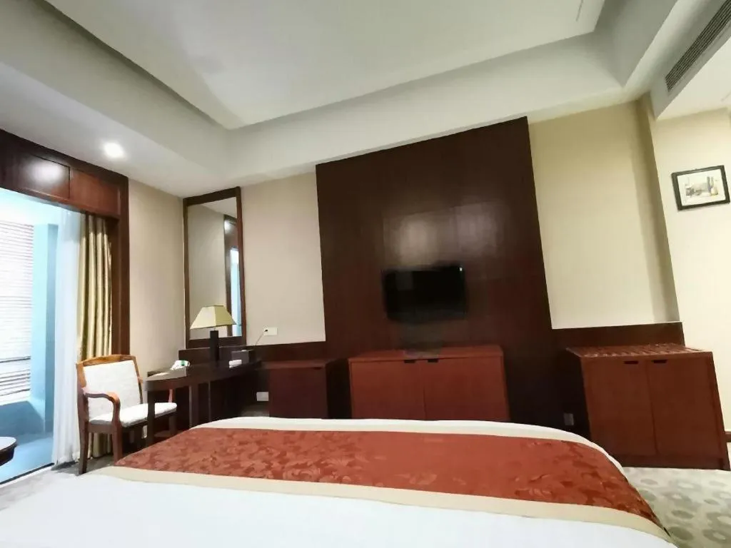 Bed in Longyan Capital International Hot Spring Resort