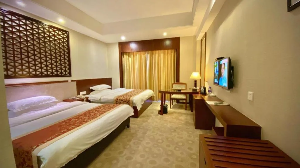 Bed in Longyan Capital International Hot Spring Resort