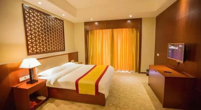Bed in Longyan Capital International Hot Spring Resort