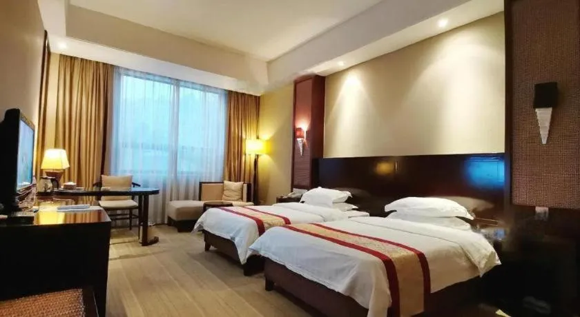Bed in Longyan Capital International Hot Spring Resort