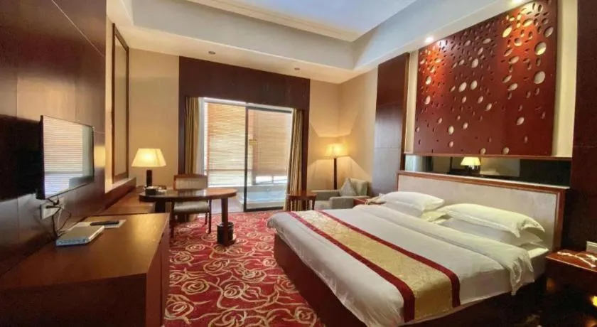Bed in Longyan Capital International Hot Spring Resort