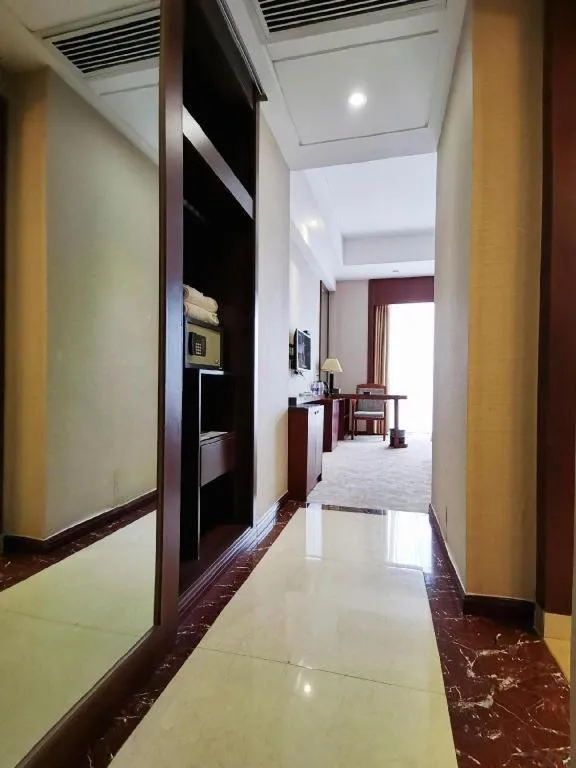 Bed in Longyan Capital International Hot Spring Resort