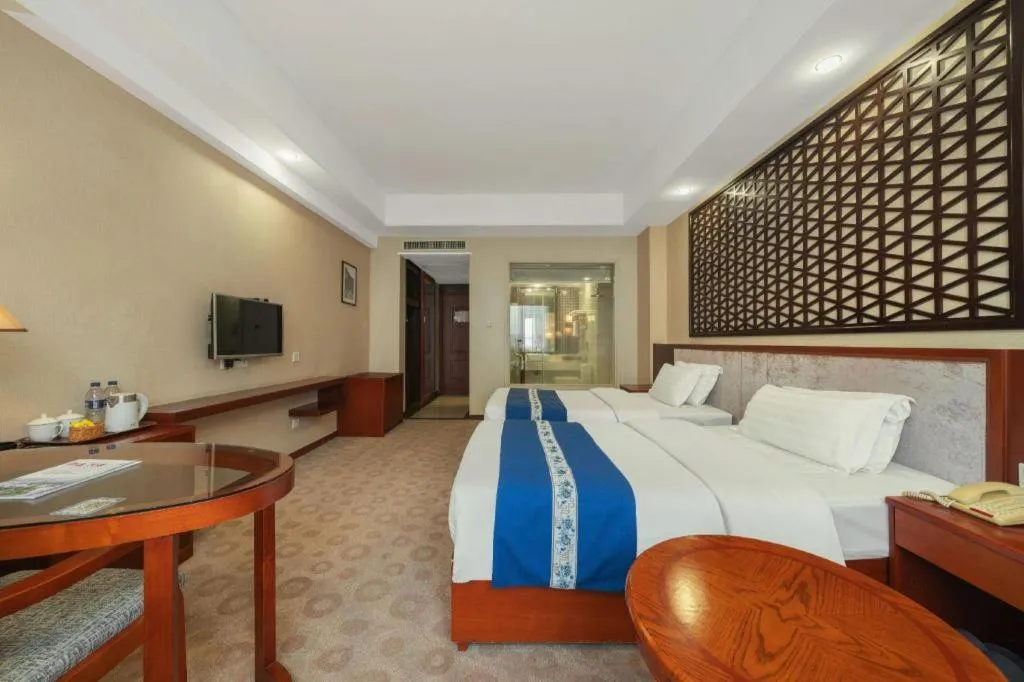 Bed in Longyan Capital International Hot Spring Resort