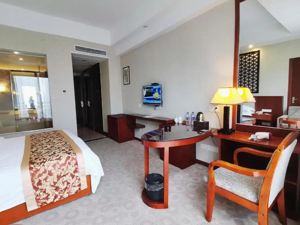 Bed in Longyan Capital International Hot Spring Resort