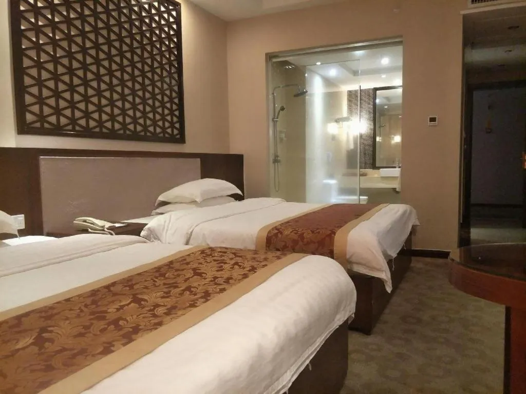 Bed in Longyan Capital International Hot Spring Resort