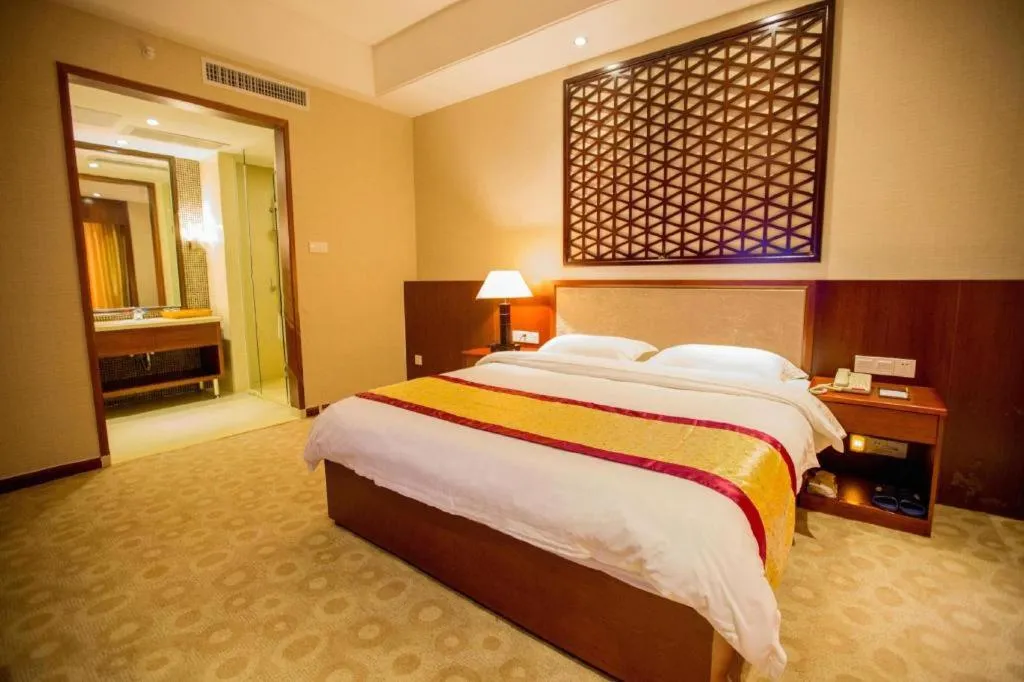 Bed in Longyan Capital International Hot Spring Resort