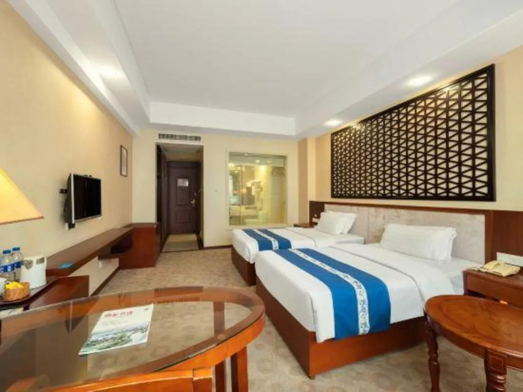 Bed in Longyan Capital International Hot Spring Resort