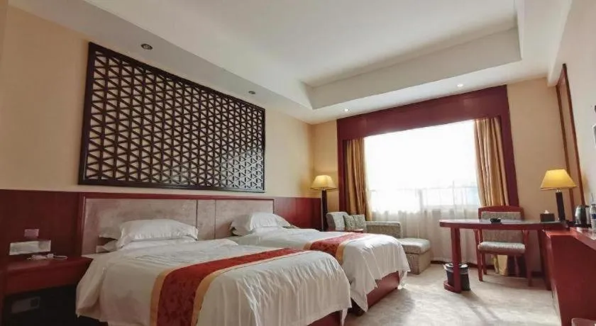 Bed in Longyan Capital International Hot Spring Resort