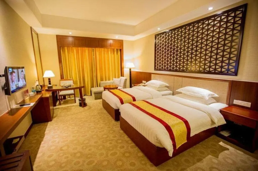 Bed in Longyan Capital International Hot Spring Resort