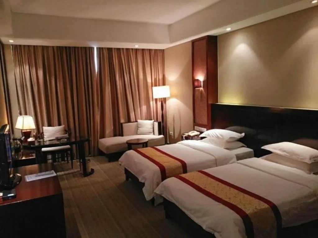 Bed in Longyan Capital International Hot Spring Resort