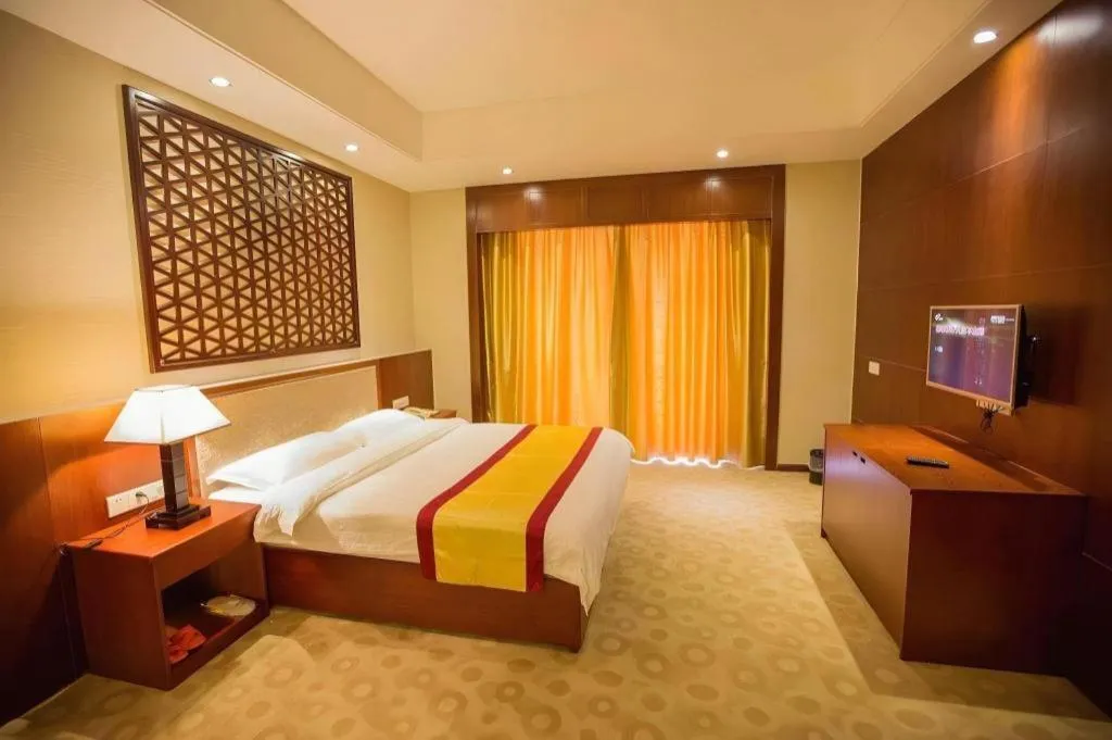 Bed in Longyan Capital International Hot Spring Resort