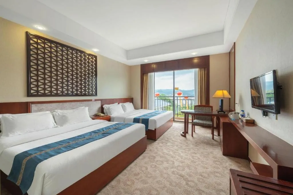 Bed in Longyan Capital International Hot Spring Resort