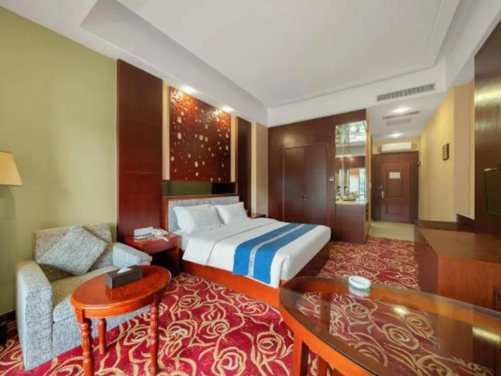 Bed in Longyan Capital International Hot Spring Resort