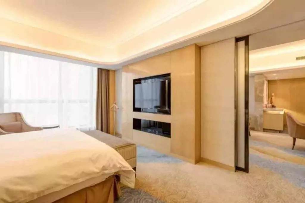 Bed in Licai Tianqi Hotel