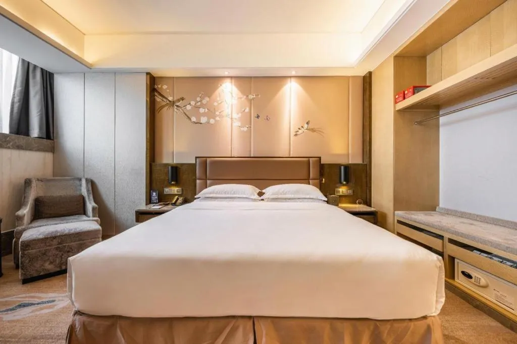 Bed in Licai Tianqi Hotel