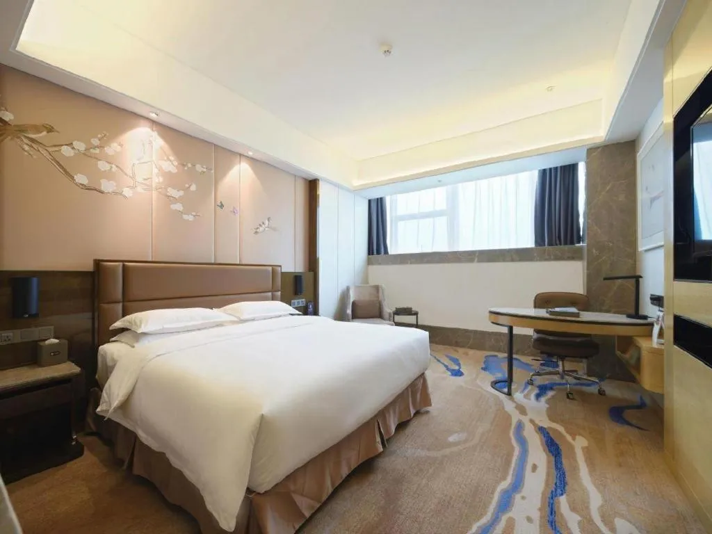 Bed in Licai Tianqi Hotel