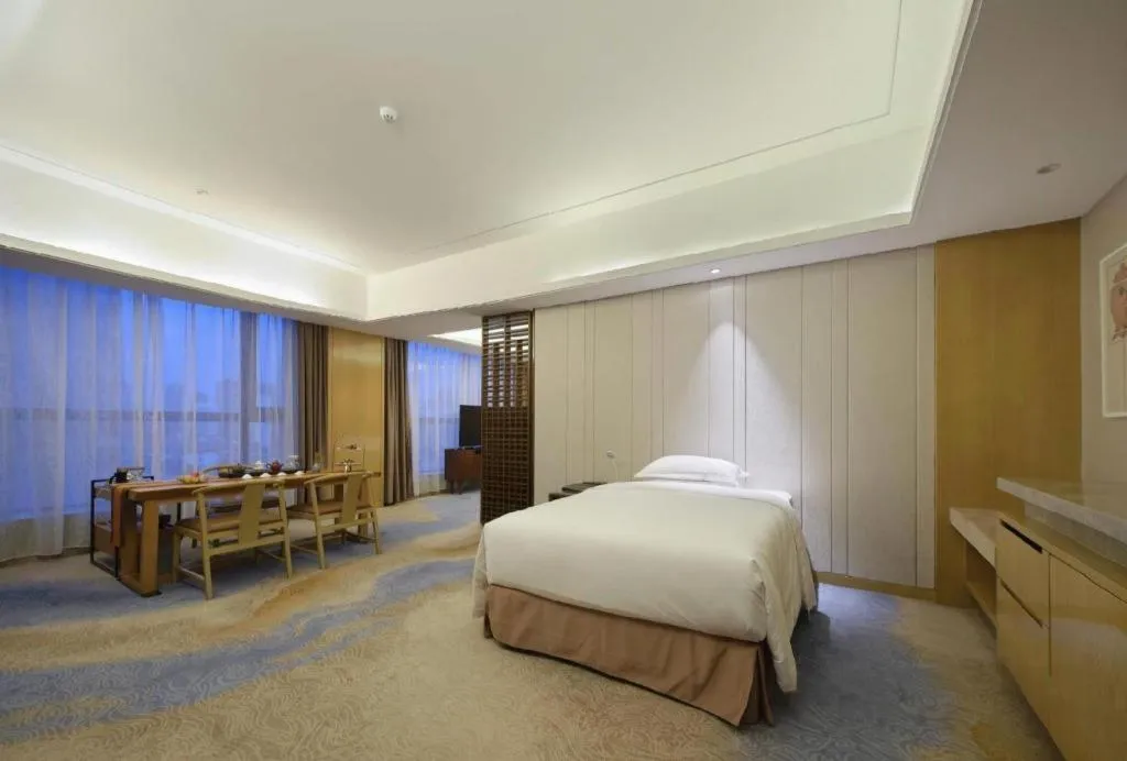 Bed in Licai Tianqi Hotel