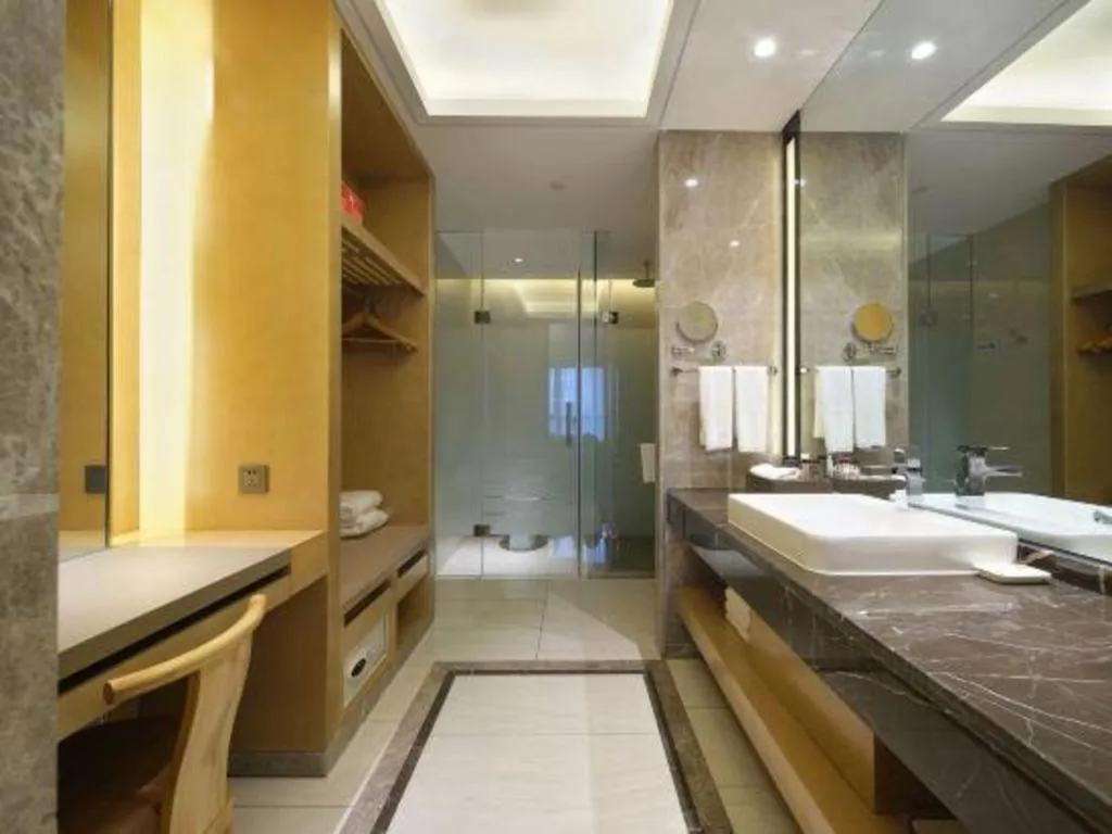 Bed in Licai Tianqi Hotel