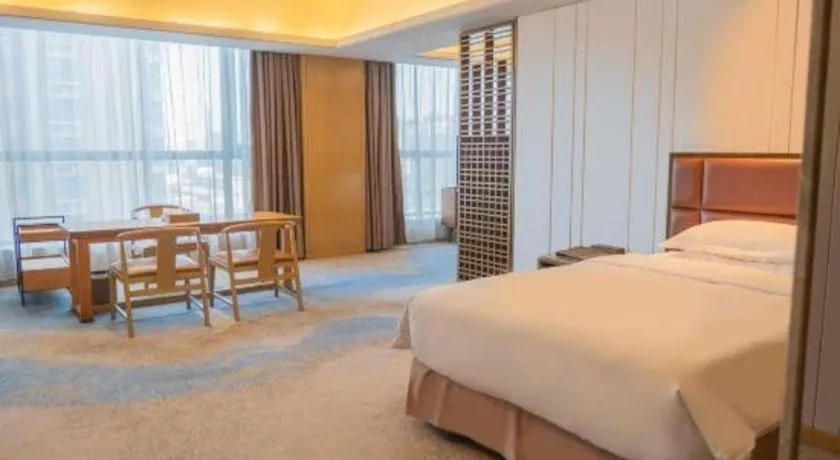 Bed in Licai Tianqi Hotel