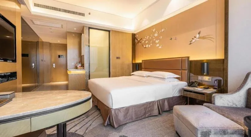 Bed in Licai Tianqi Hotel