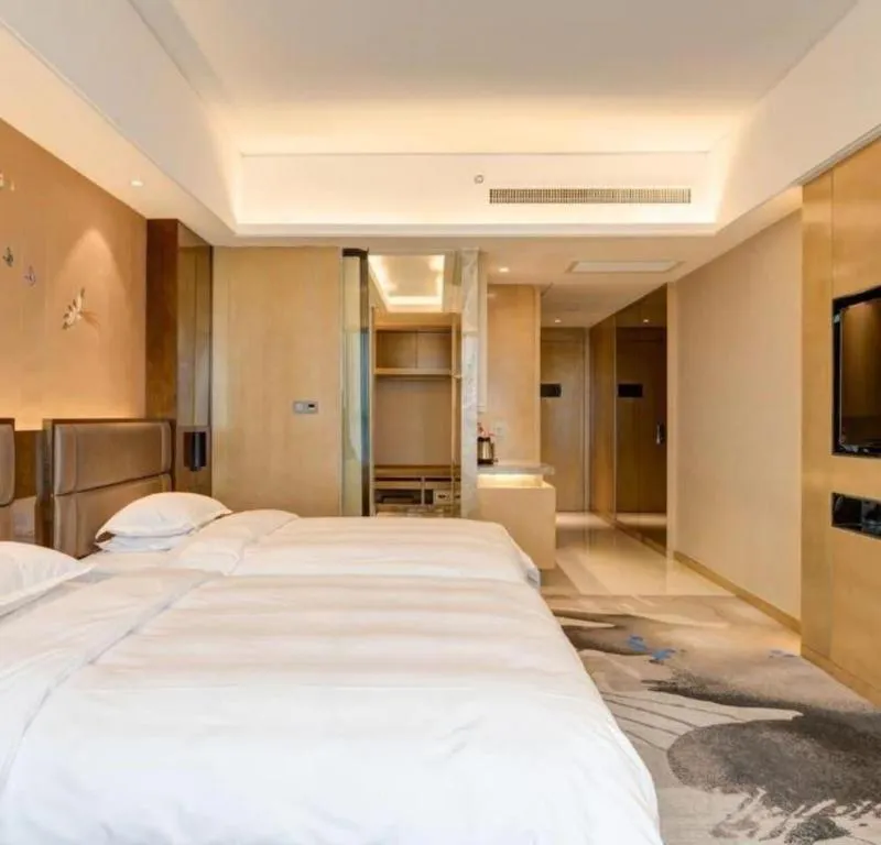 Bed in Licai Tianqi Hotel