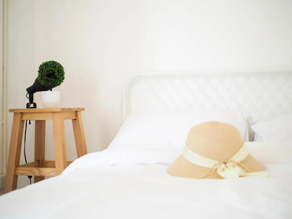 Bed in Unyak Room Ayutthaya