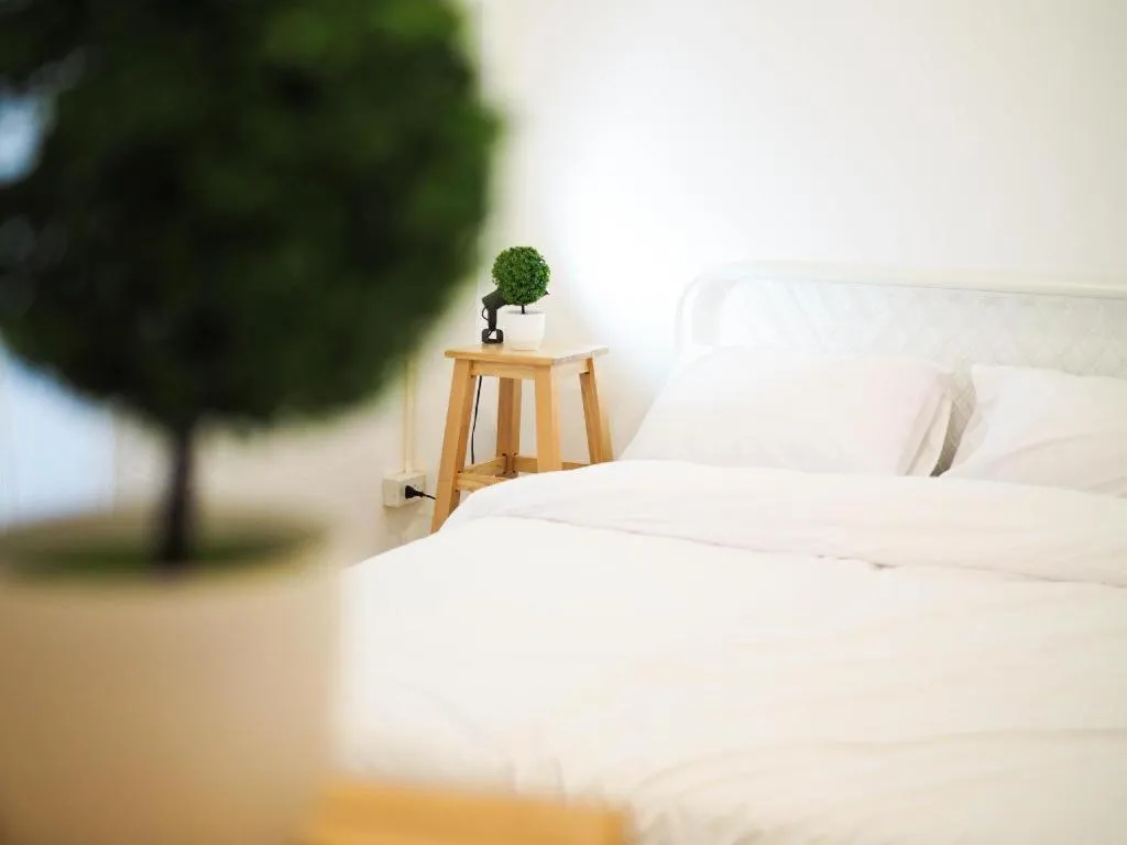 Bed in Unyak Room Ayutthaya