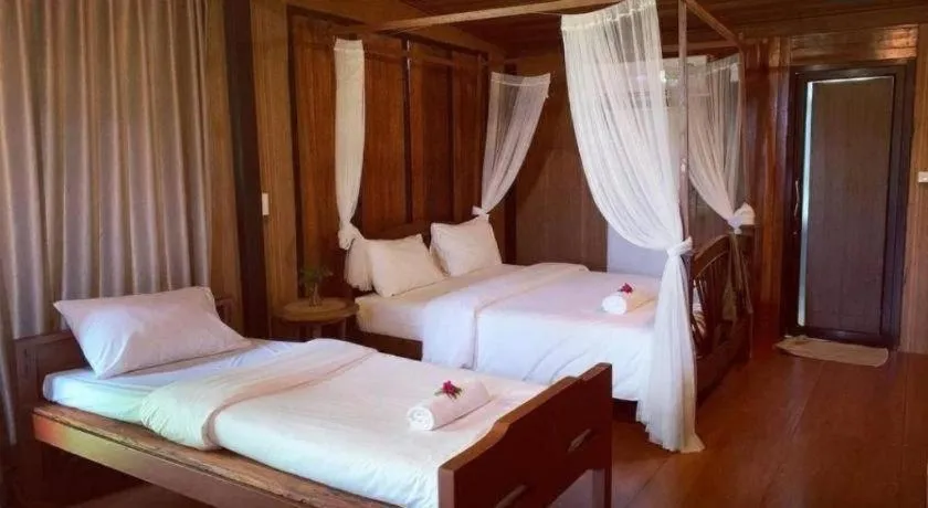 Bed in Le Bassin Erawan Resort
