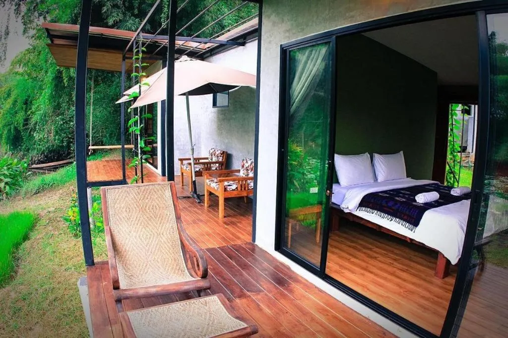 Bed in Le Bassin Erawan Resort