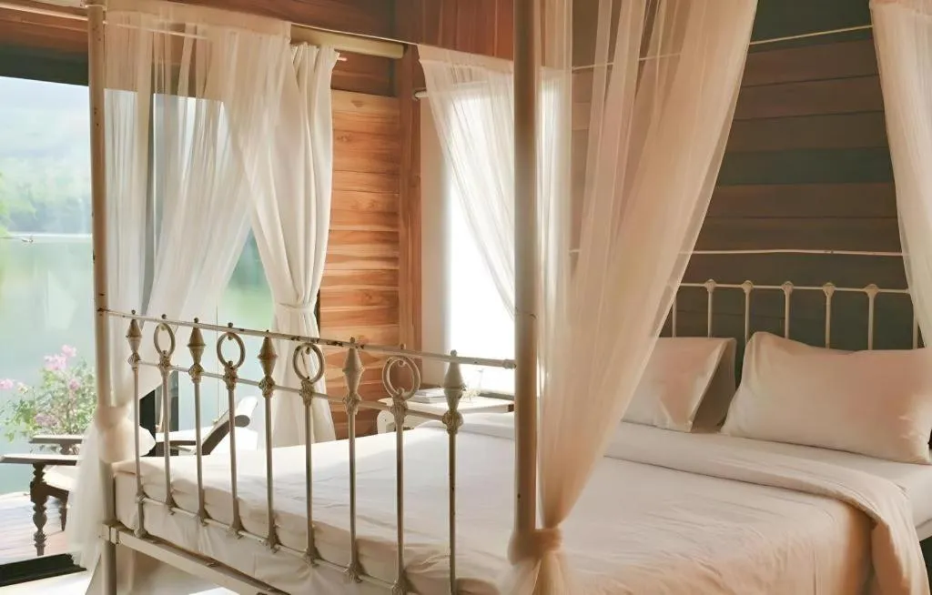 Bed in Le Bassin Erawan Resort